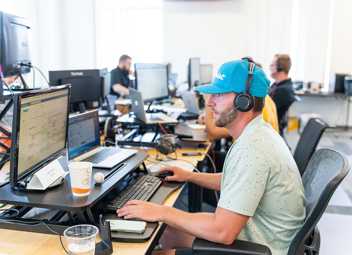 Buildertrend sales person working at work station